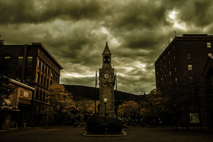 The same town square as before with a yellow color theme